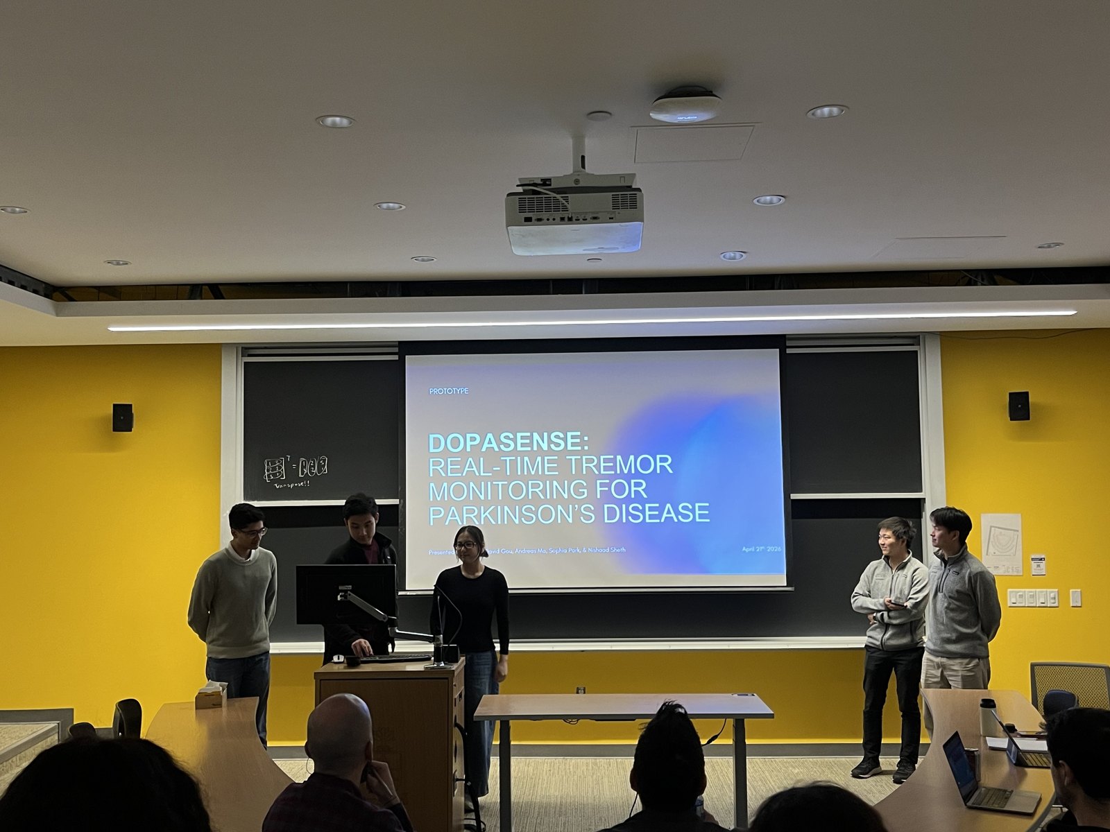 Team presenting slides to the expert panel