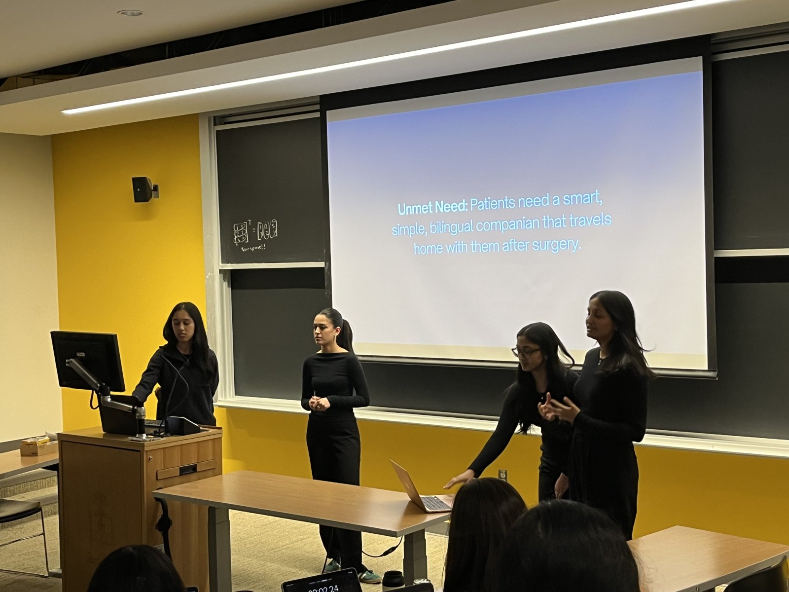 A team fielding questions from the judging panel